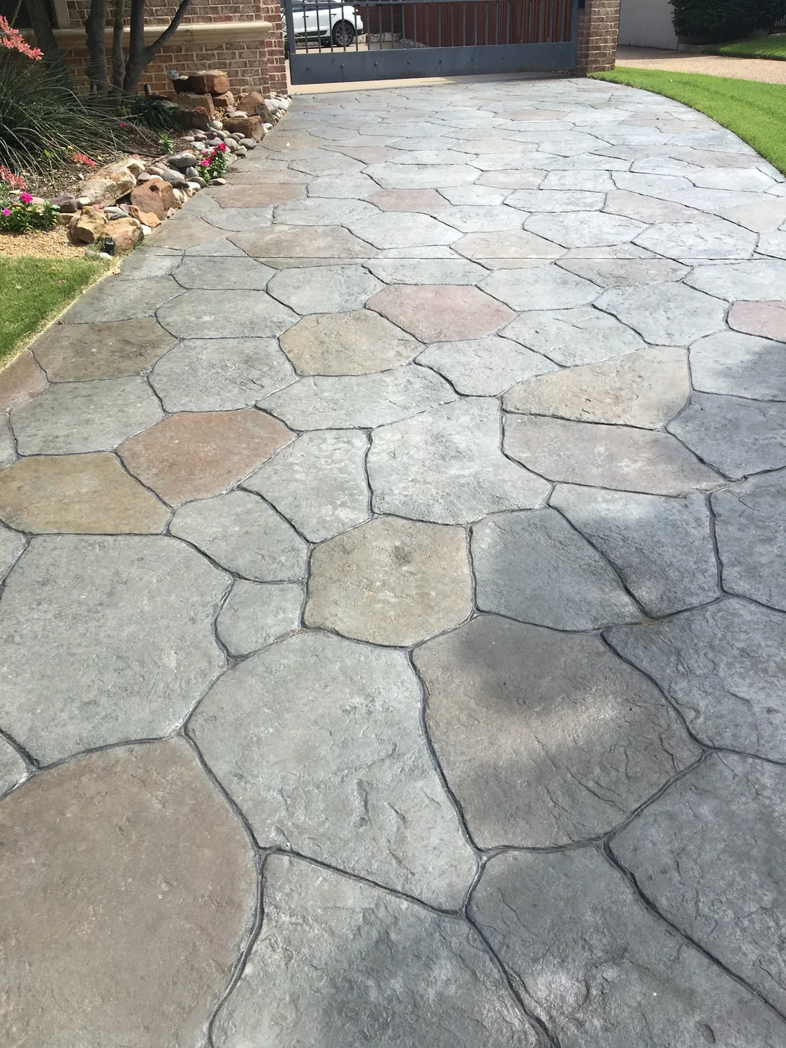 A stamped backyard transformation by Lucky’s Concrete in St. Louis